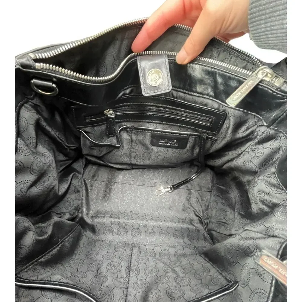 Michael Kors black leather silver tote handbag expandable magnetic zip closure